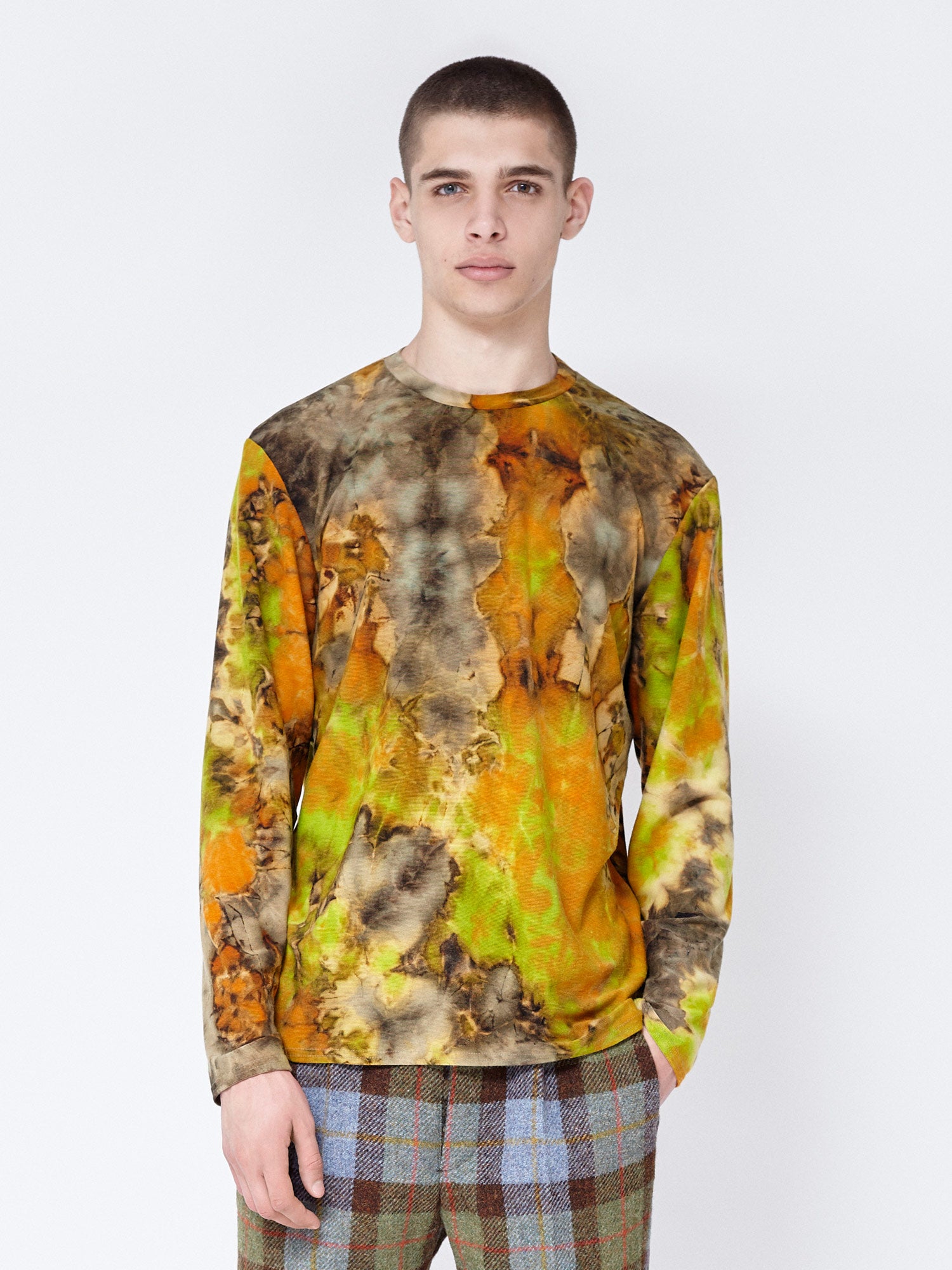 Tie Dye Long sleeve tee shirt. Crew neck. Vibrant green, orange yellow make up an acid like print.